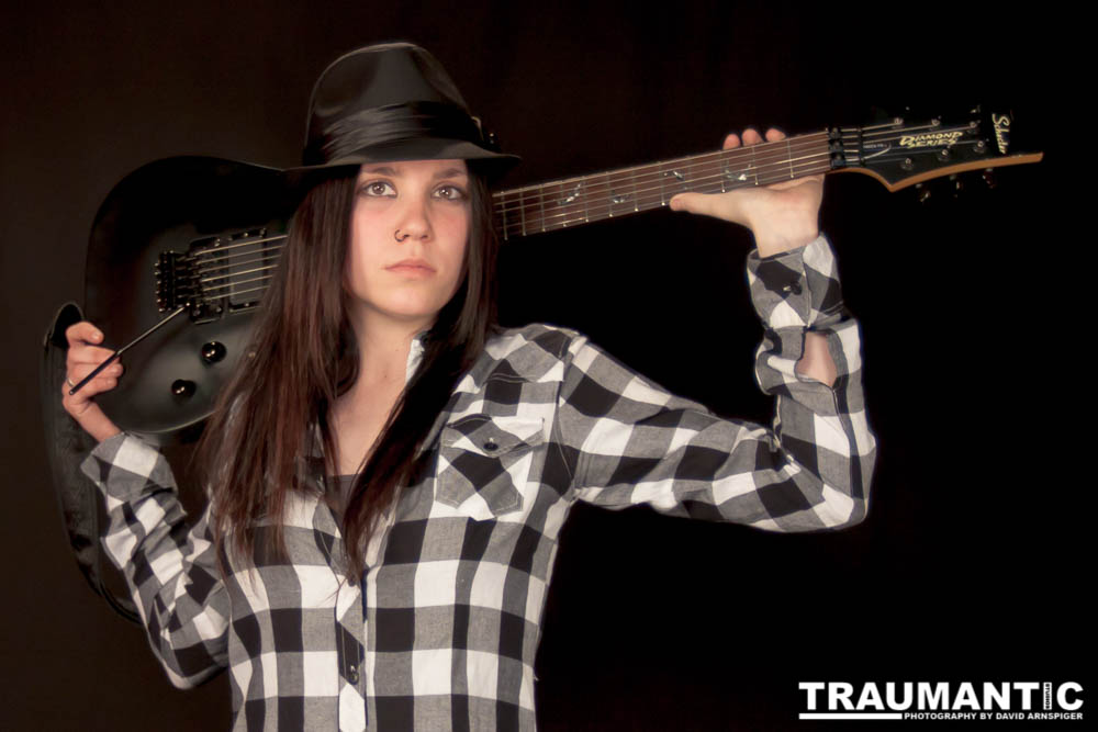 I saw an amazing picture on a web site of this female guitarist.  She was beautiful.  After a bit of searching, I was able to contact her and we did this shoot together.